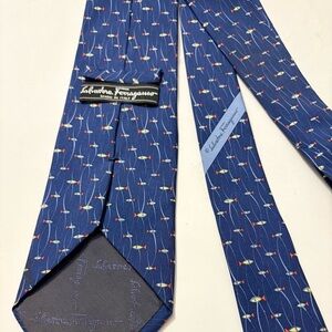 FERRAGAMO
Silk Printed Tie Ferragamo Navy Tie with Colorful Design